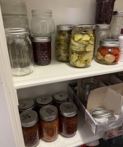 jars of home canned food in pantry