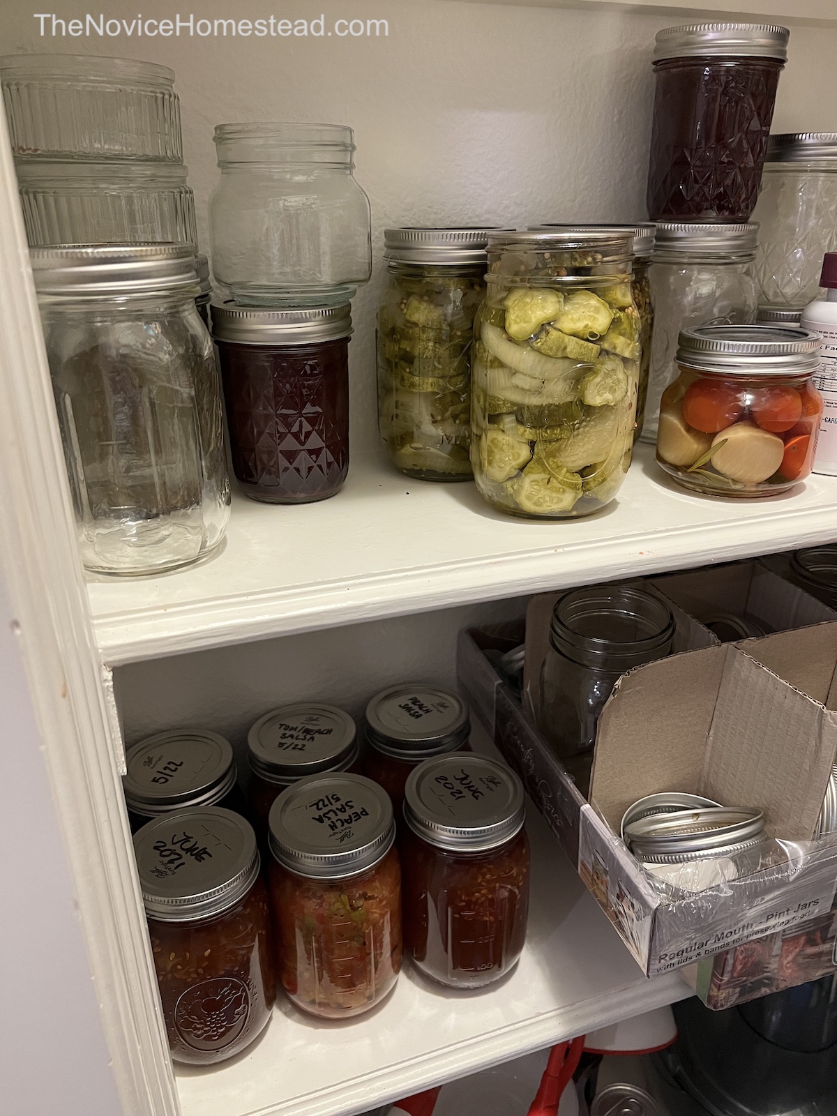pantry with jars of canned food