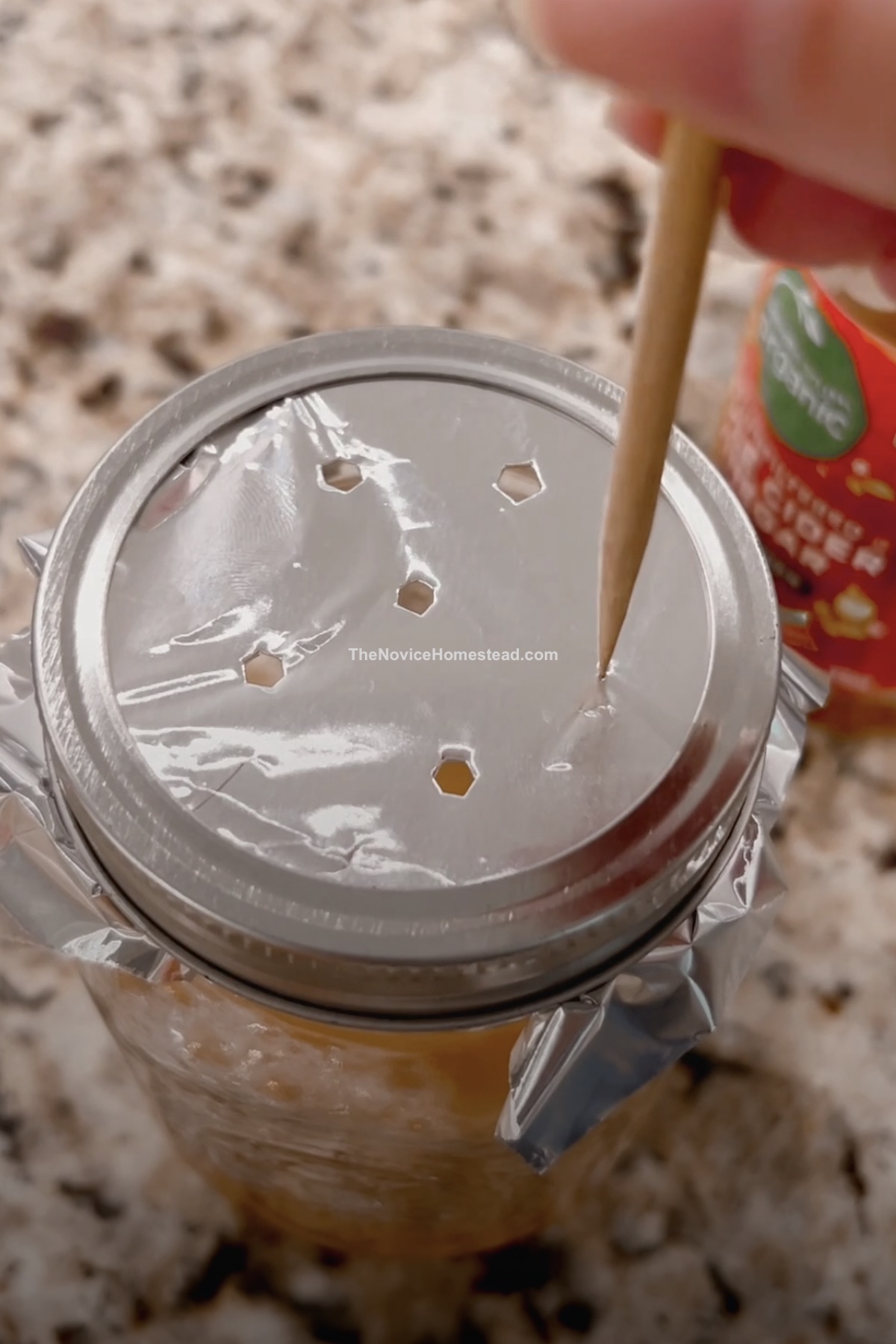 poking holes in aluminum foil when making a DIY trap for fruit flies.